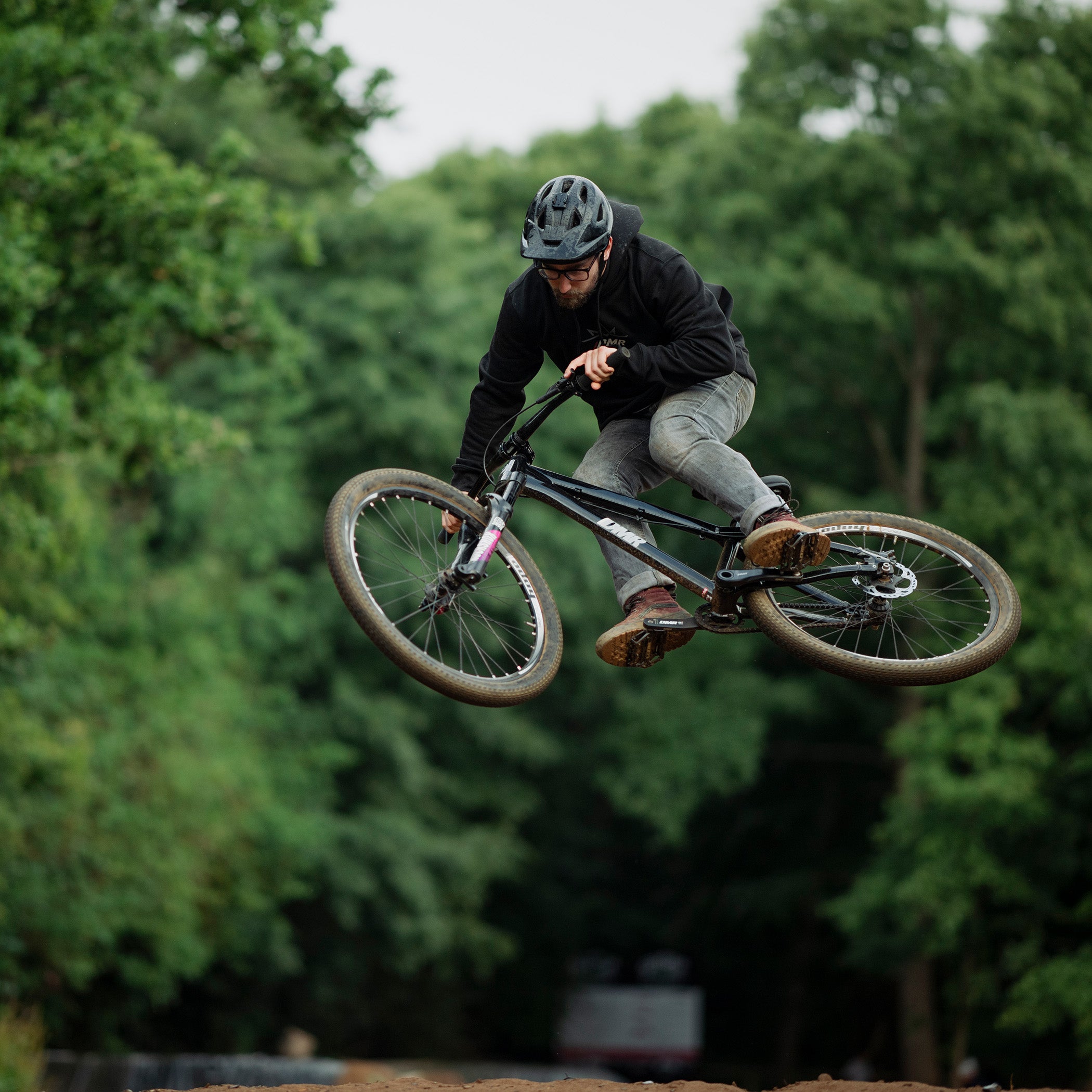 DMR Staff Member James Wyatt jumping a bike
