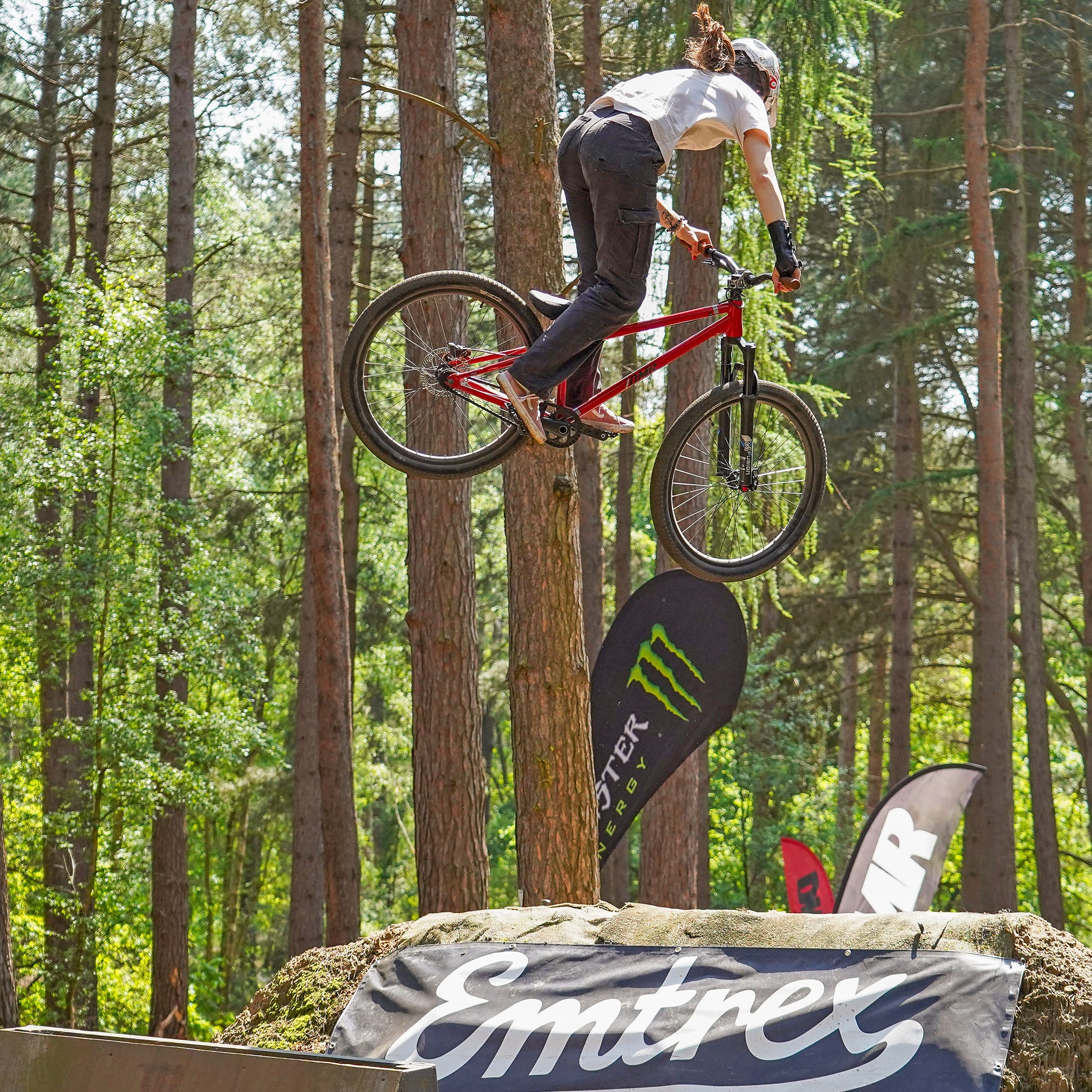 DMR Rider Kerenza Scott Jumping a Bike
