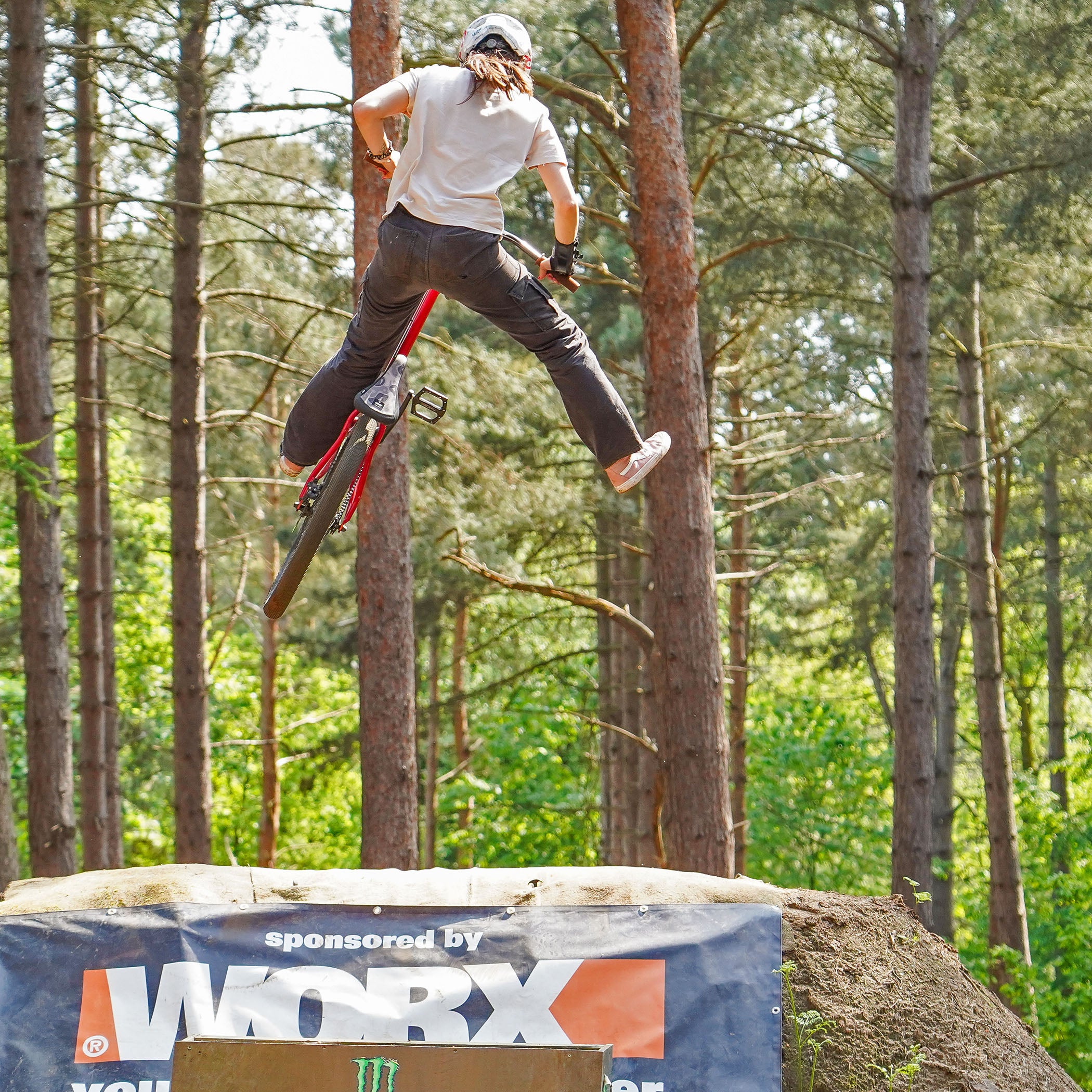 DMR Rider Kerenza Scott Jumping a Bike