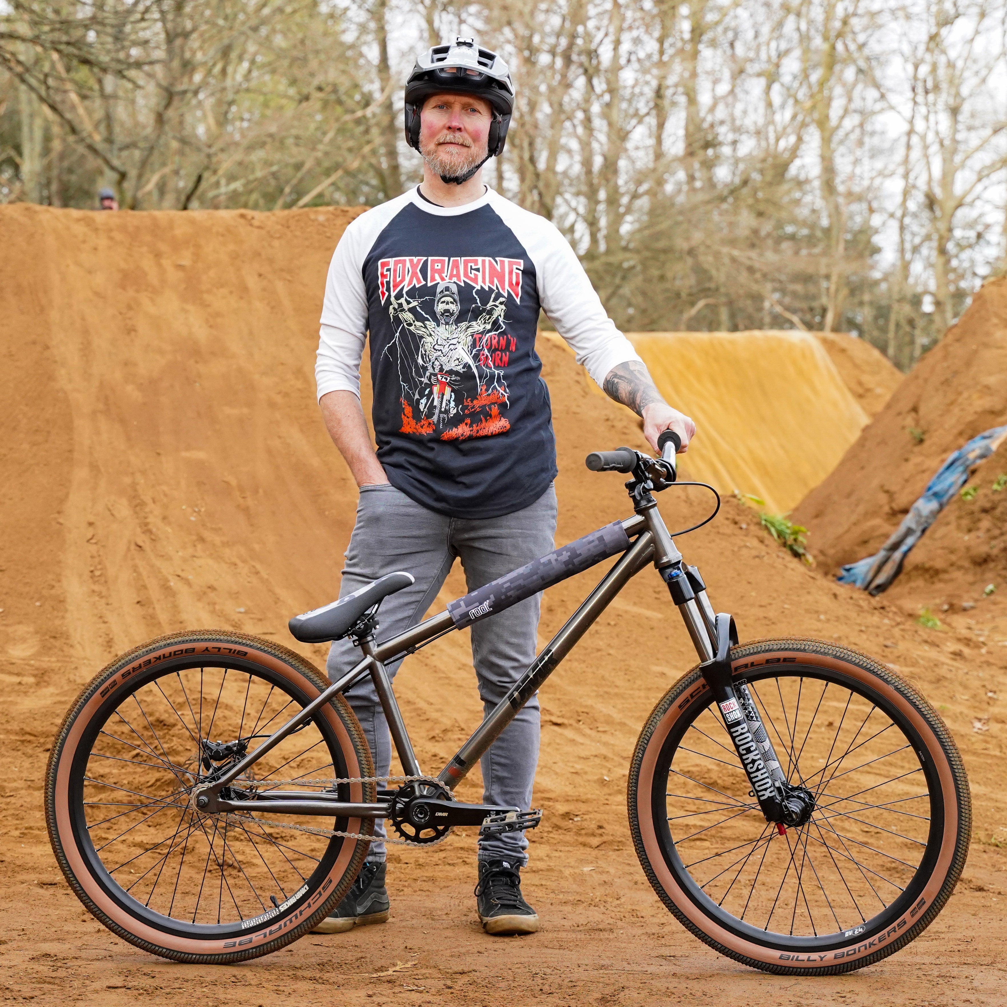 DMR Rider Steve Geall Holding a Bike