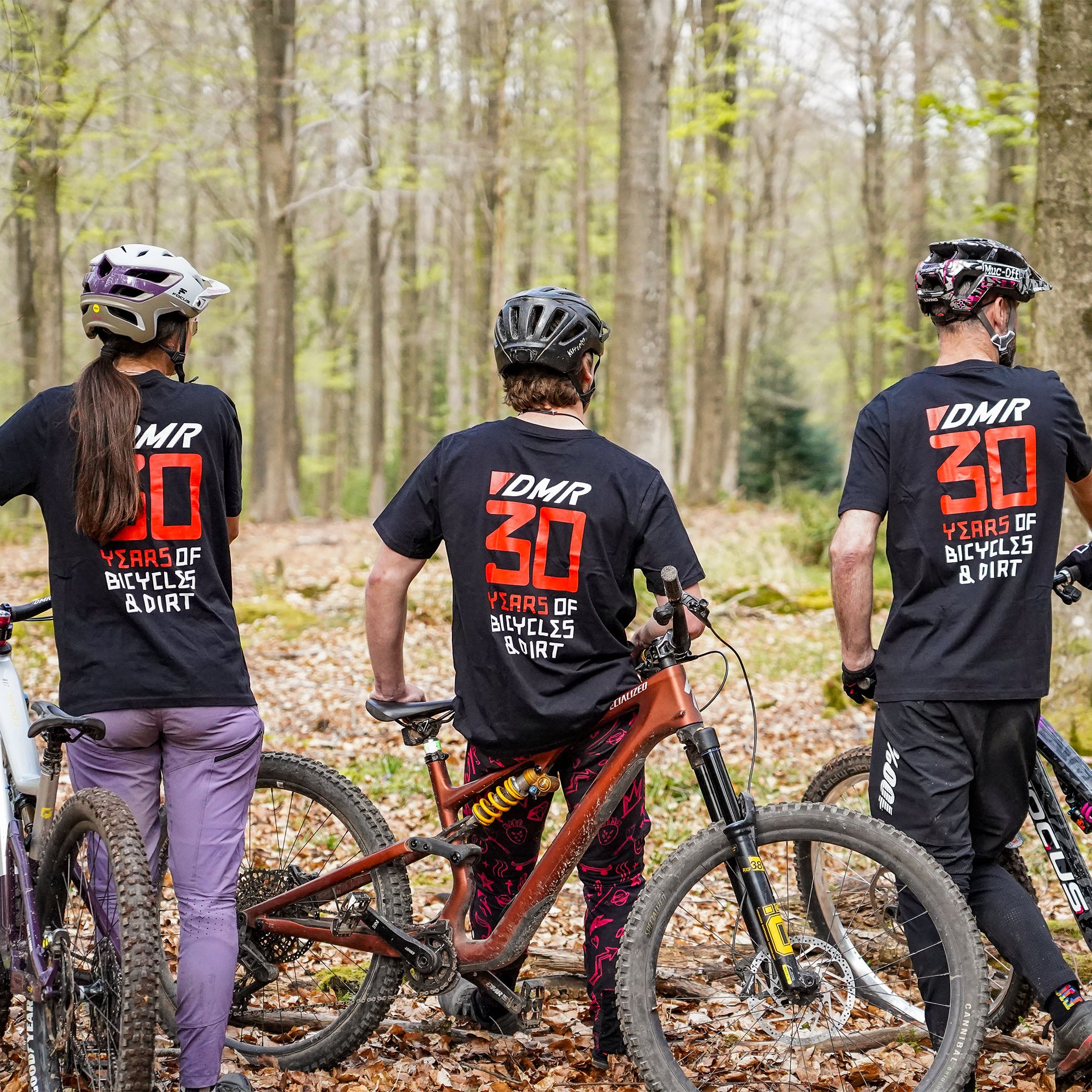 DMR Riders Ben Deakin Preston William and Kerenza Scott wearing 30 year anniversary t-shirt