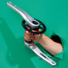 DMR Axe Crank Silver in Hand through paper