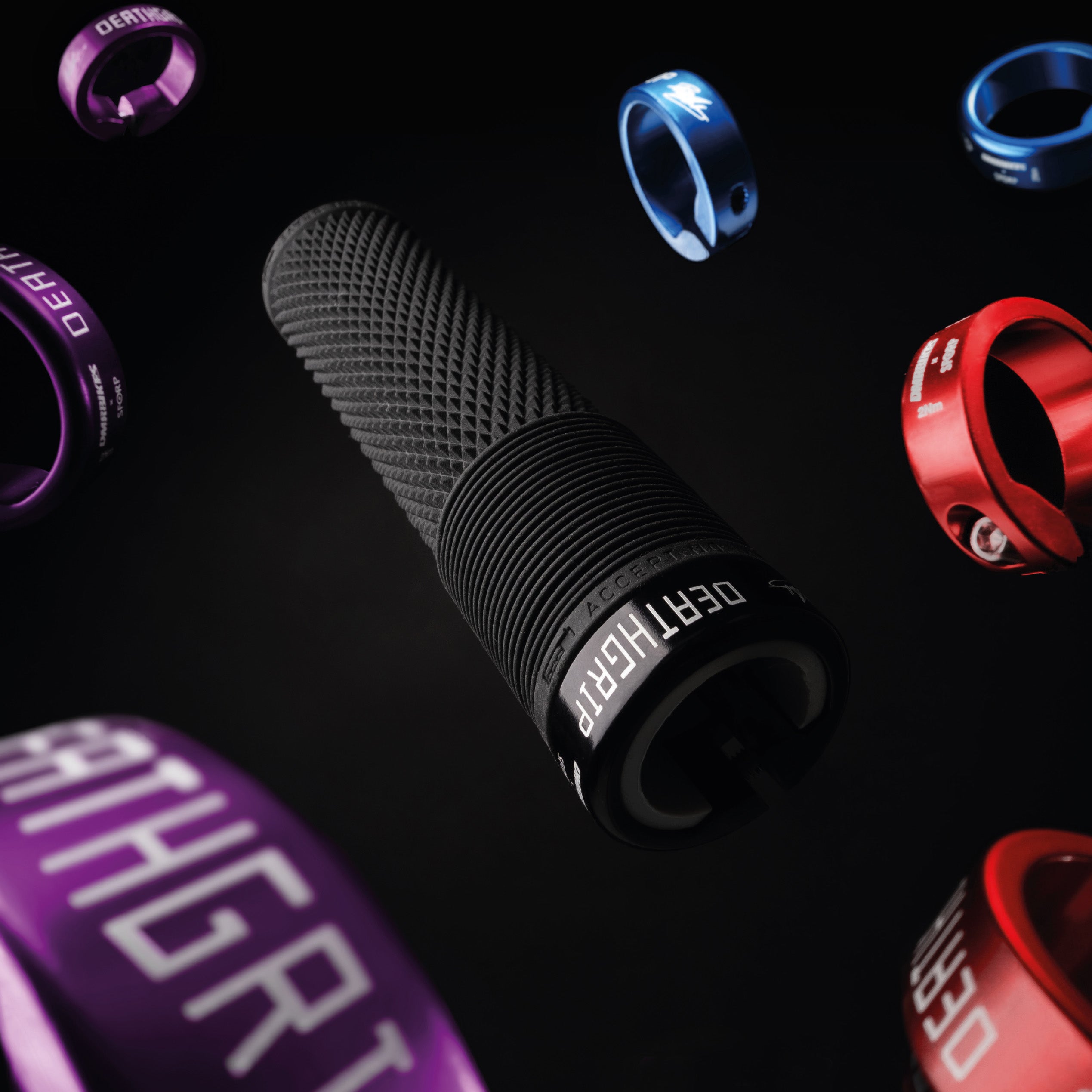 DMR Deathgrip MTB bicycle grip floating with coloured collars around it