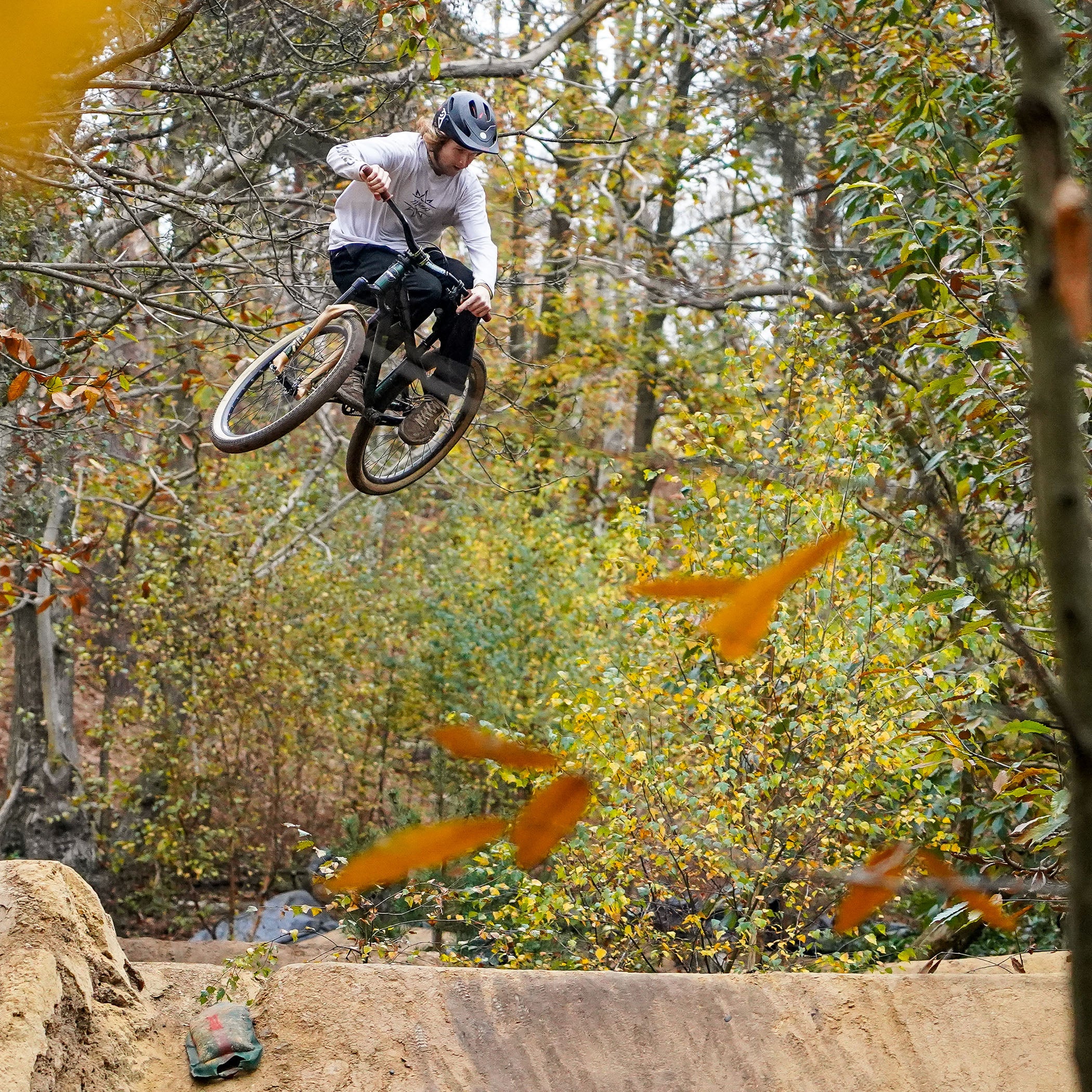DMR Rider Andy Lehmann jumping a bike