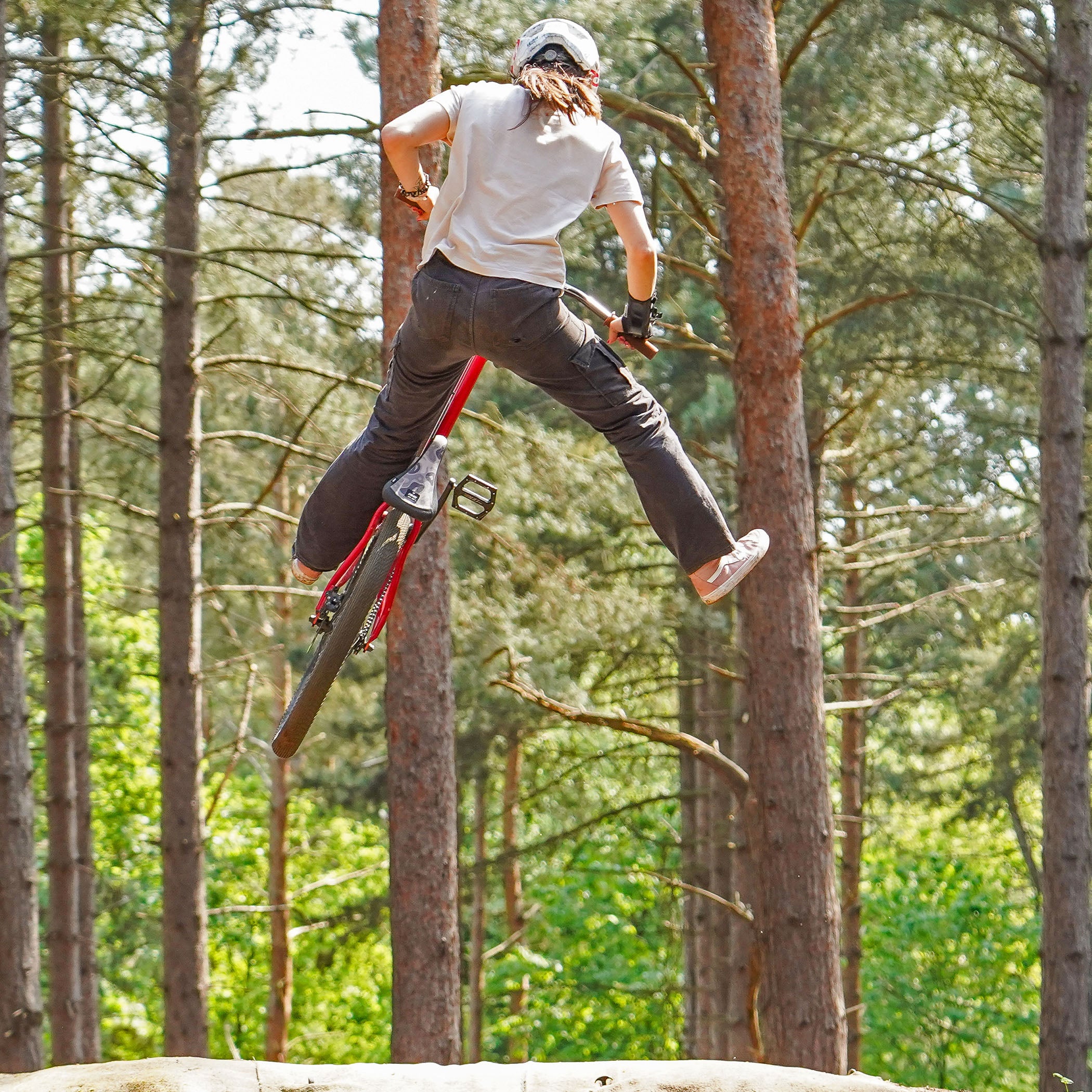 DMR Rider Kerenza Scott jumping a bike