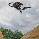 DMR Staff Member James Wyatt jumping a bike