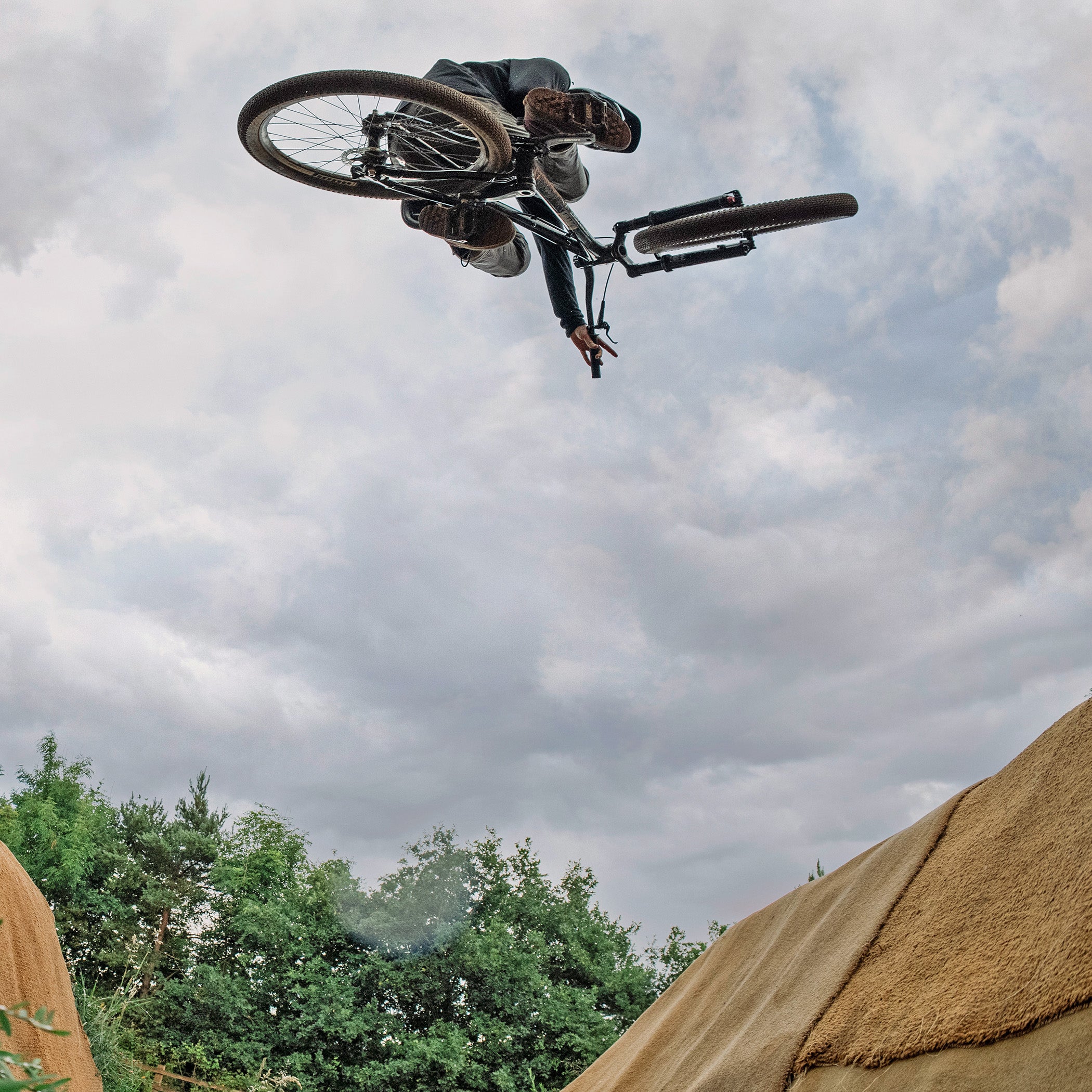DMR Staff Member James Wyatt jumping a bike