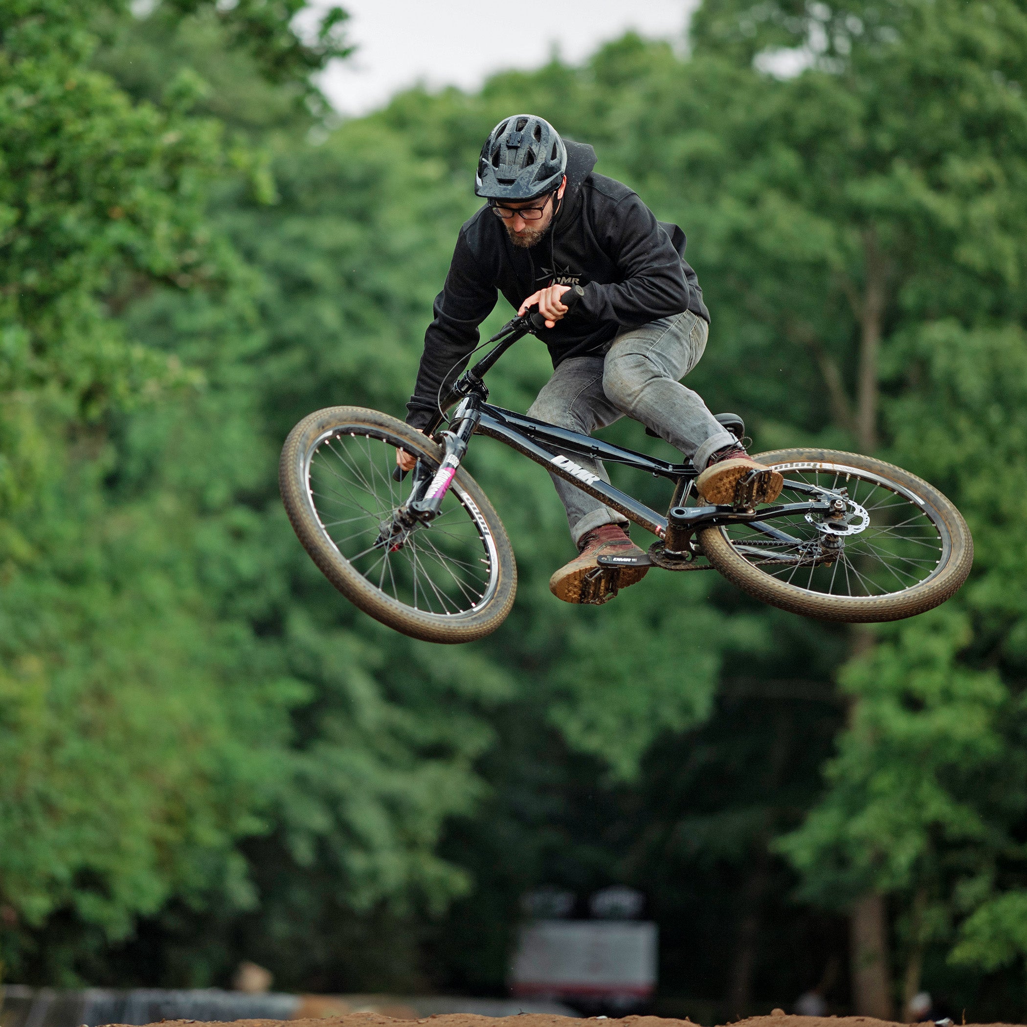 DMR Staff Member James Wyatt jumping a bike