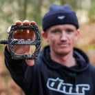 DMR Rider Sam Marzetti holding a pedal