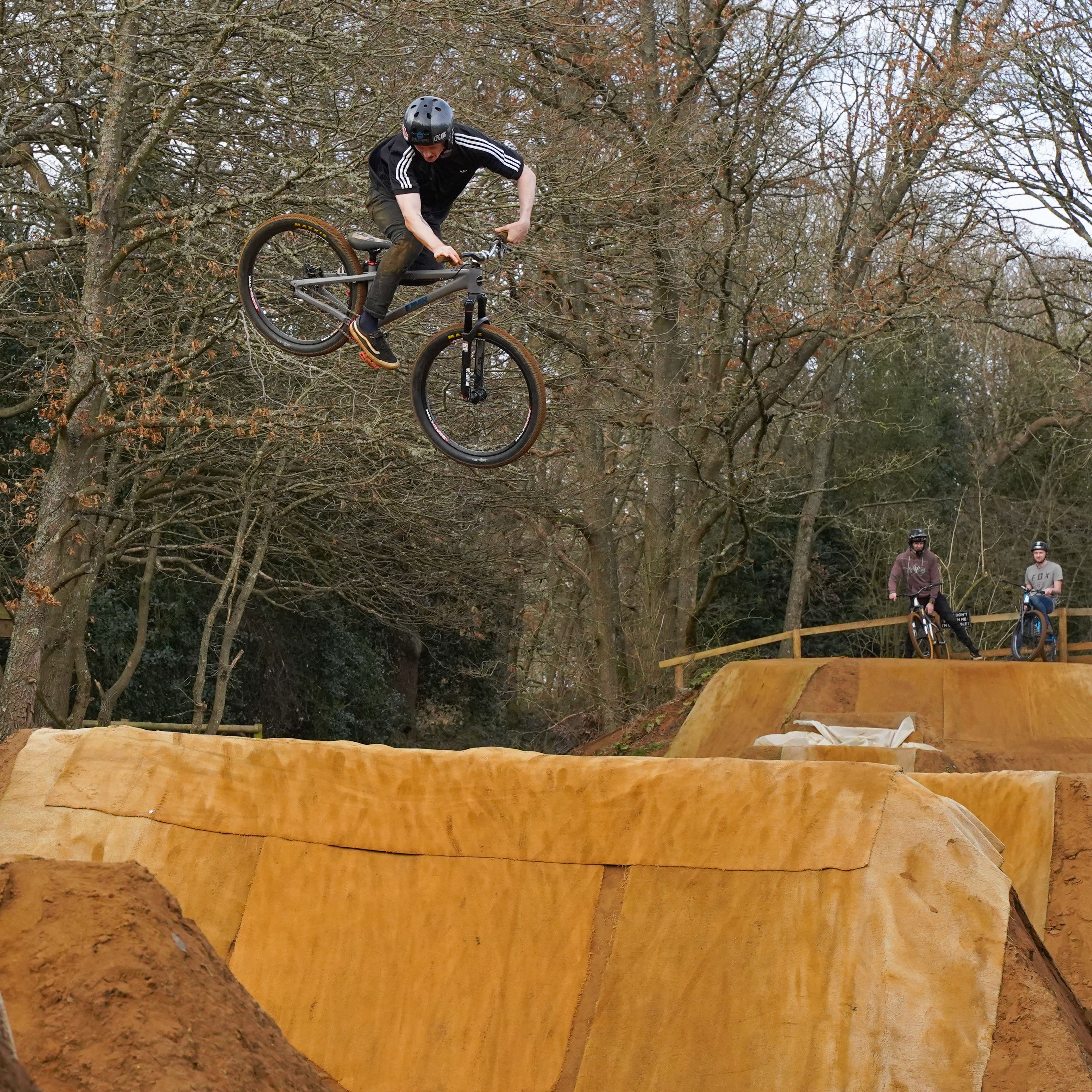 DMR Rider Jumping a Bike