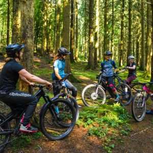 DMR Rider Katy Kurd in a group of bike riders