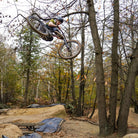 DMR Rider Ed Knight jumping a bike