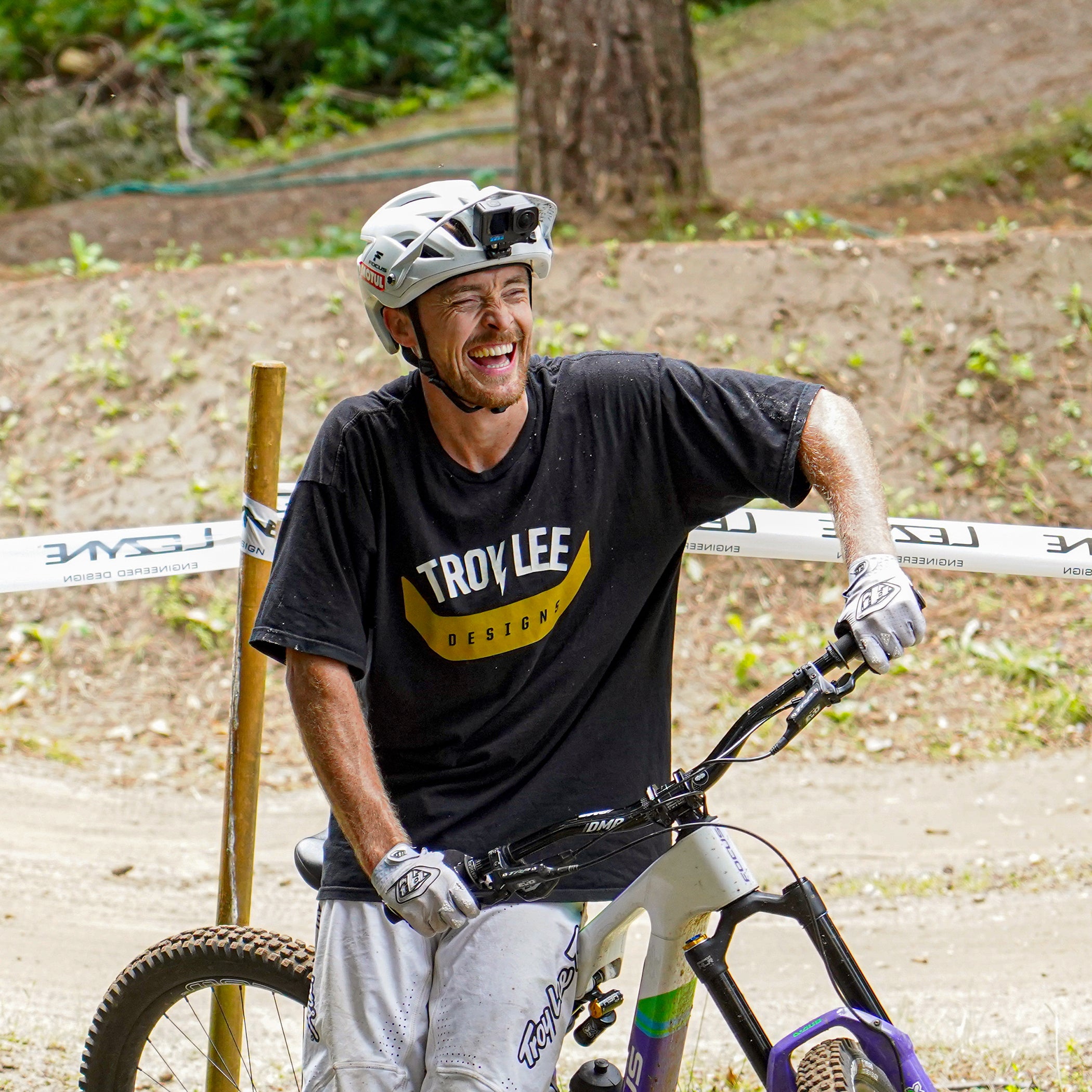 DMR Rider Olly Wilkins sitting on a Bike