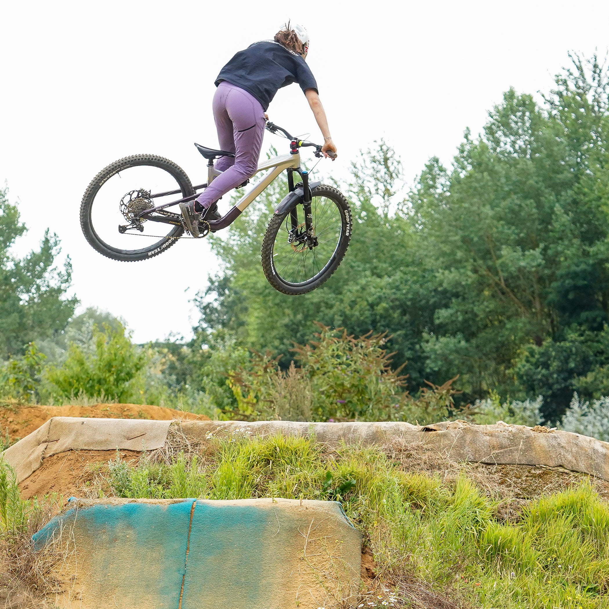 DMR Rider Kerenza Scott Jumping a Bike