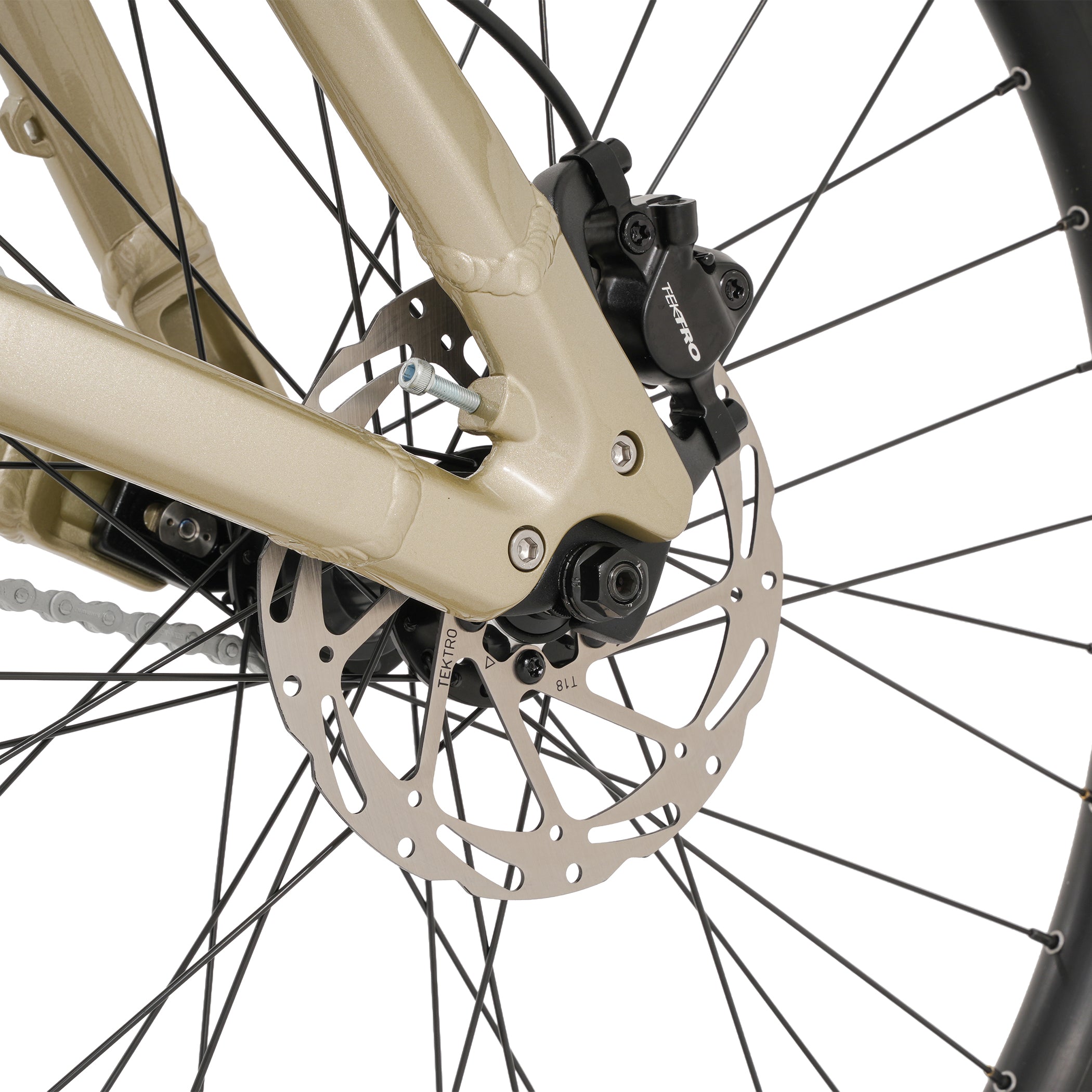Close-up of a bicycle wheel with disc brake system on a white background