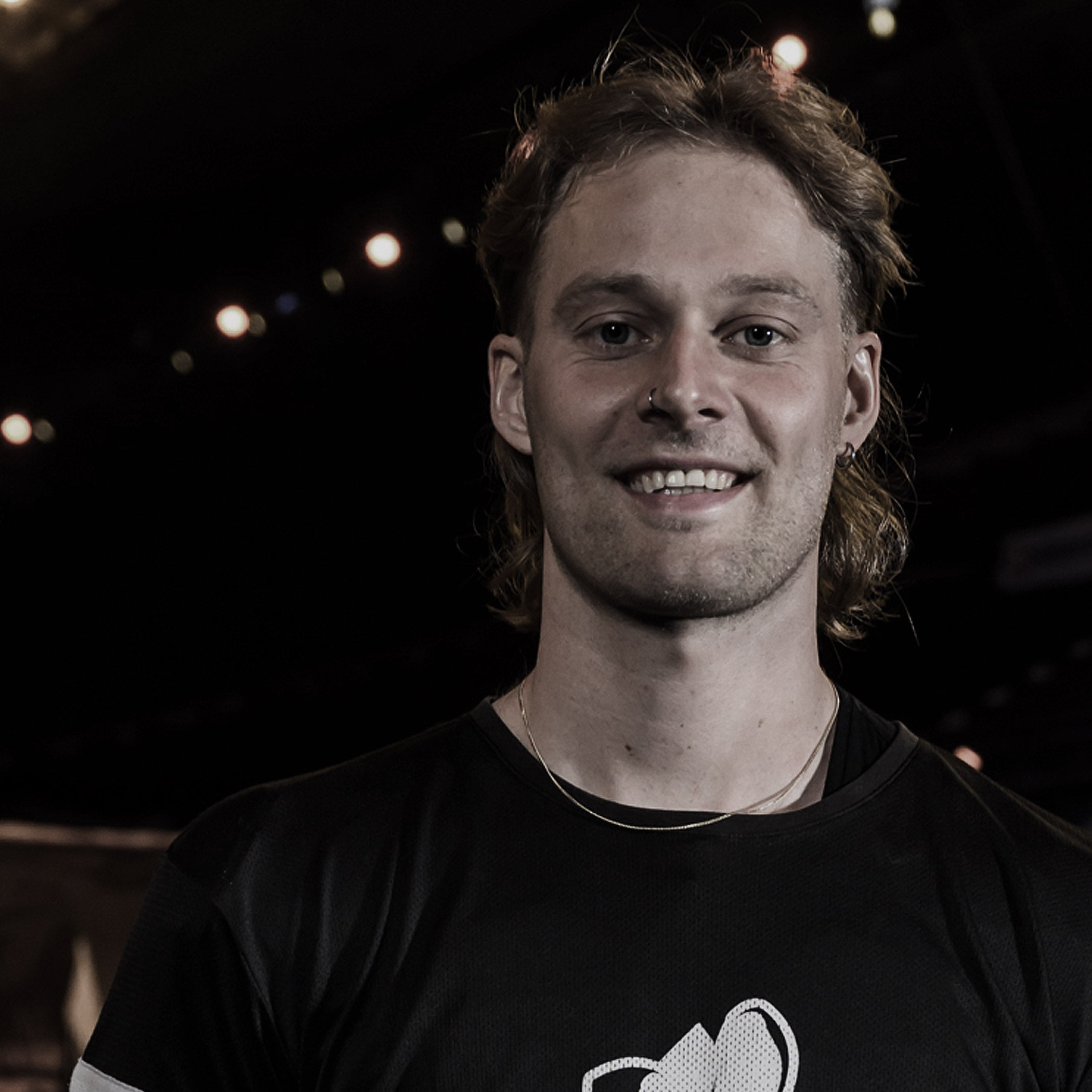 Black and white portrait of a man with a blurred background
