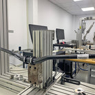 DMR Odub handlebar on a testing machine in a laboratory setting