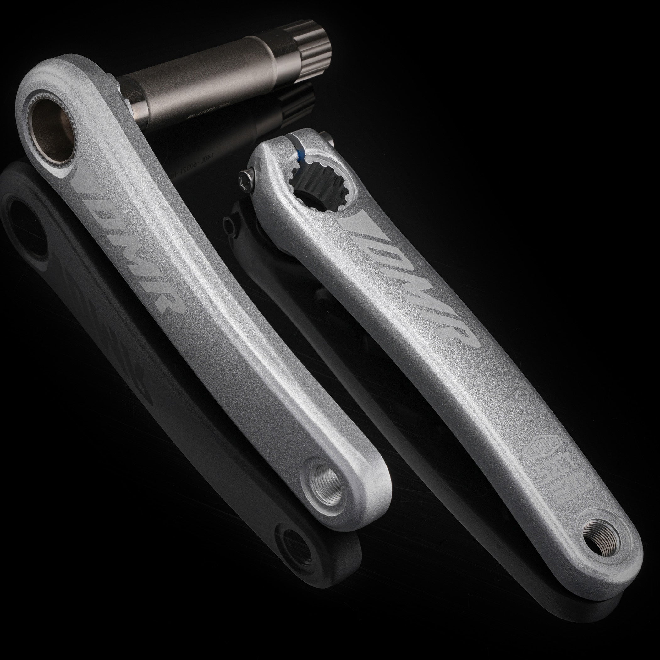 DMR Sect Cranks in Silver, on a black background.