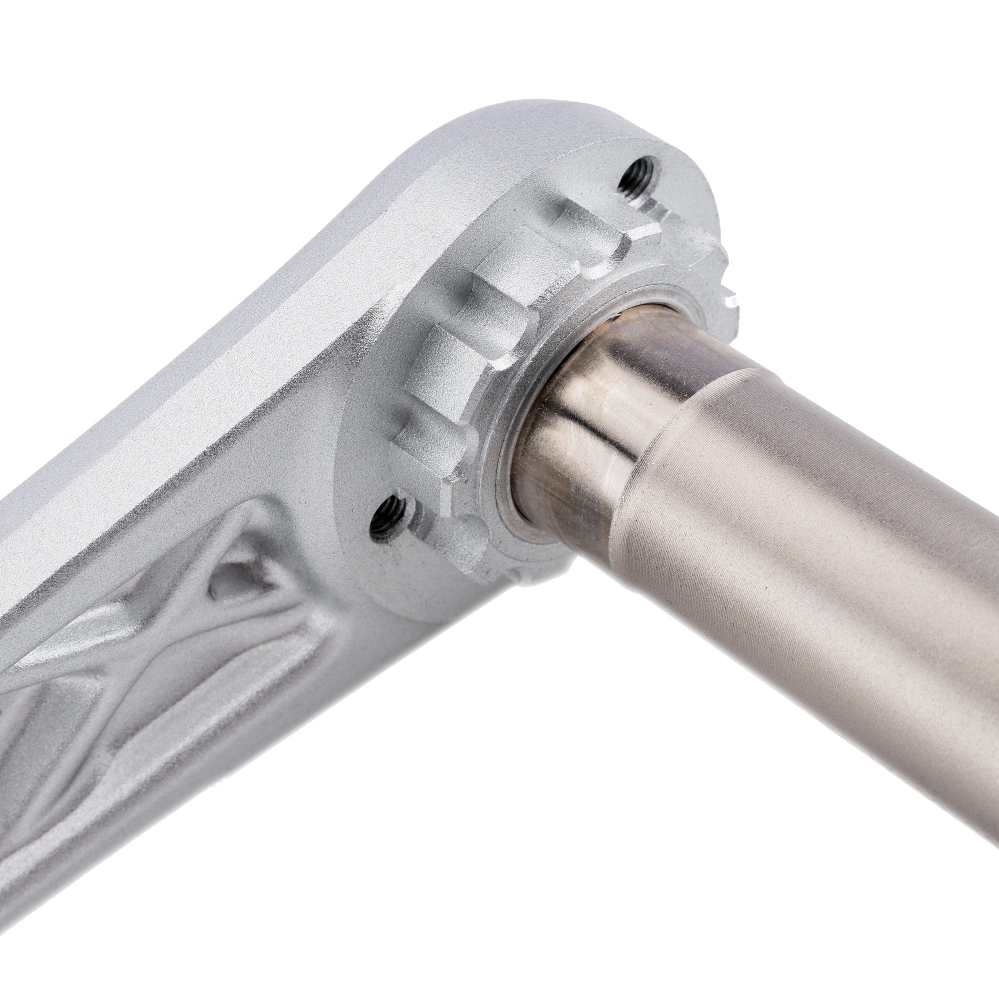 Close-up of a metallic bicycle CRANK with intricate design on a white background