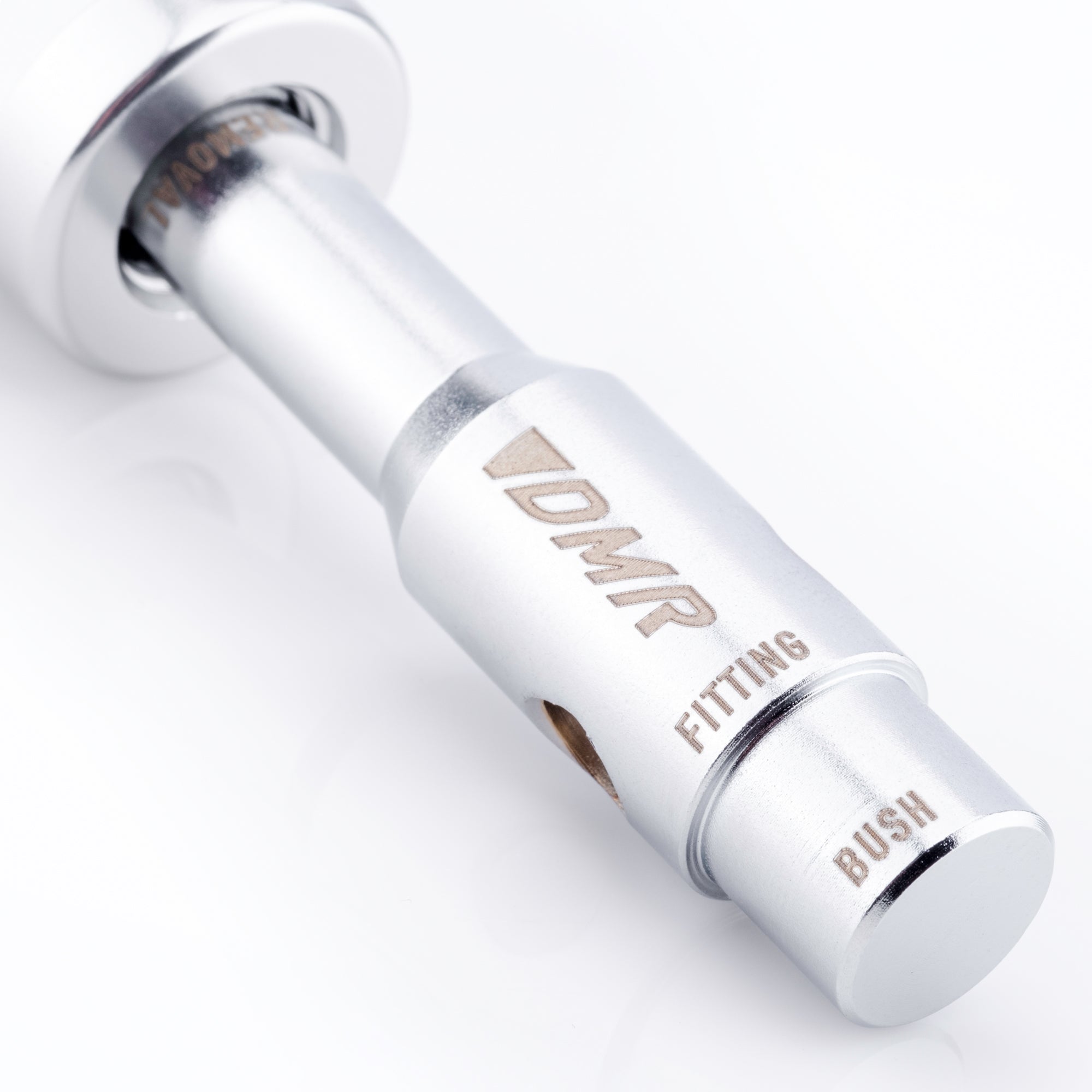 close-up of a silver dmr bikes bicycles vmax vault mag midi v12 v11 flat4 flat 4 four versa clip clipless pedals pedal service servicing tool on a white background