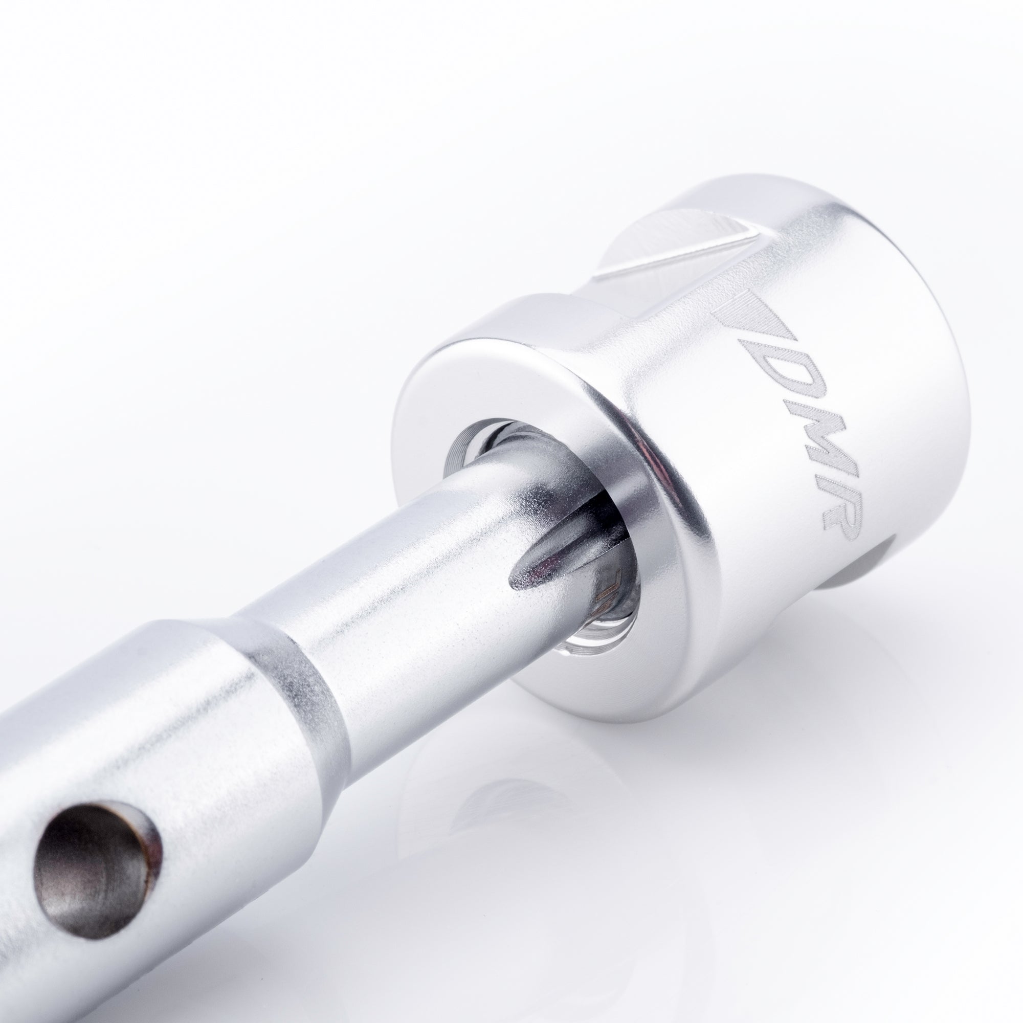 close-up of a silver dmr bikes bicycles vmax vault mag midi v12 v11 flat4 flat 4 four versa clip clipless pedals pedal service servicing tool on a white background