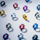 Colorful grip collars with visible brand name on a light gray background