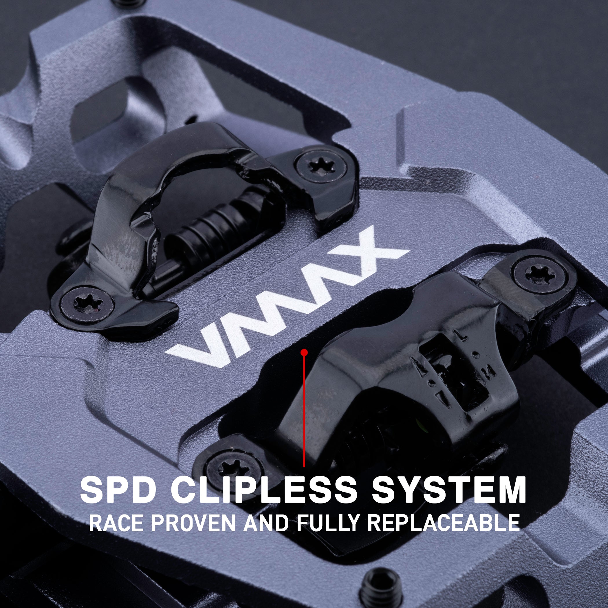 Close-up photograph of the DMR VMAX clipless clip clipped spd cleat mtb off-road mountain cycling cycle bike biking pedal pedalling product, coloured in Grey, showing cleat mechanism. This mtb off-road mountain cycling cycle bike biking pedal pedalling product has been placed on a dark grey background.