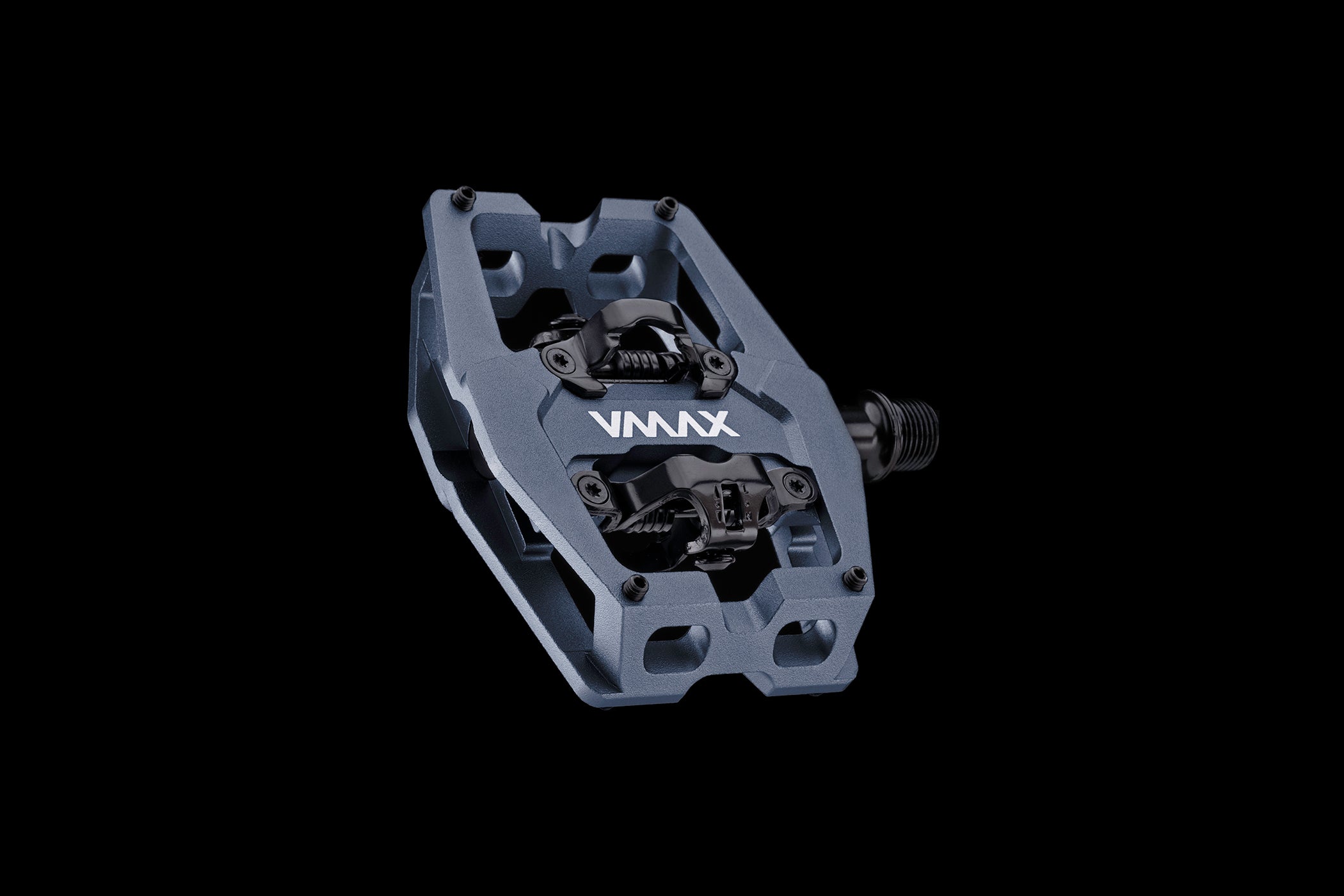 Photograph of the DMR VMAX clipless clip clipped spd cleat mtb off-road mountain cycling cycle bike biking pedal pedalling product, coloured in RD Grey. This mtb off-road mountain cycling cycle bike biking pedal pedalling product has been placed on a black background.